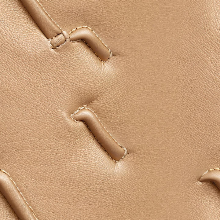 Beige Grainy Leather with Stitched Padded Details seamless PBR texture preview