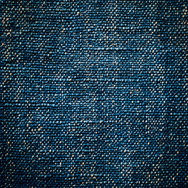 Cracked Denim Fabric With Worn Blue Weave And Frayed Fibers seamless PBR texture preview