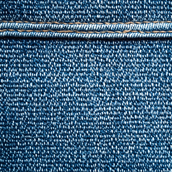 Cracked Denim Fabric With Detailed Stitching In Blue seamless PBR texture preview