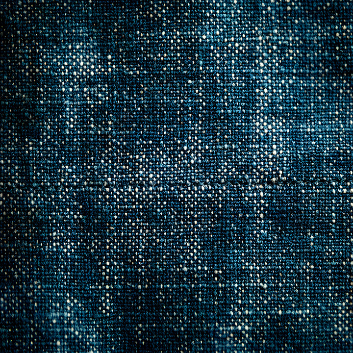 Cracked And Holed Textile Fabric In Dark Blue With Distressed Pattern seamless PBR texture preview