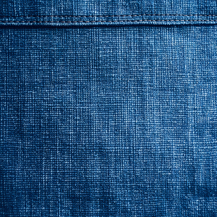 Cracked Denim Fabric with Blue Worn Surface and Stitch Detail seamless PBR texture preview