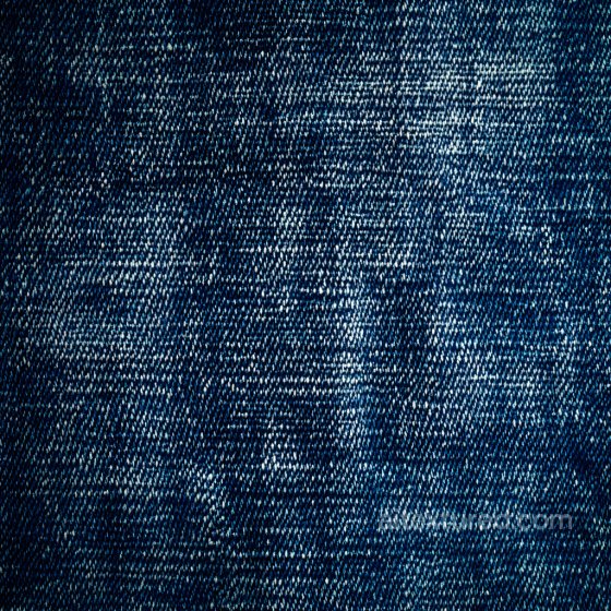 Denim Jeans Texture of Cracked Dark Blue Denim Fabric with Worn, Distressed Weave Denim jeans texture preview