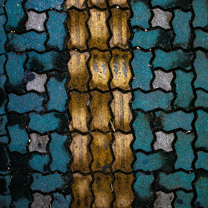 Painted Interlocking Pavement Ground with Yellow Stripes Asphalt seamless PBR texture preview