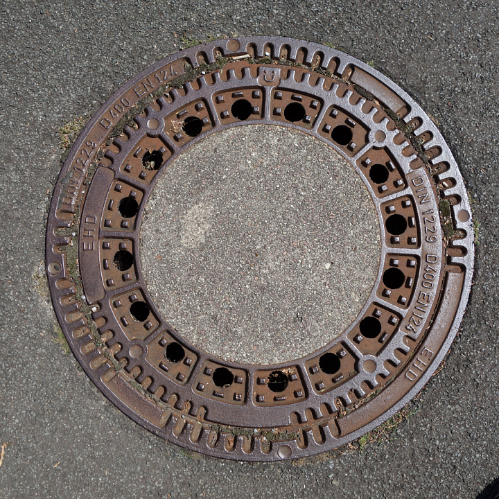 Rusty Cast Iron Manhole Cover for Asphalt seamless PBR texture preview