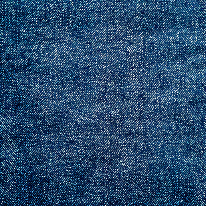 Cracked Denim Fabric with Frayed Weave and Worn Indigo Blue seamless PBR texture preview
