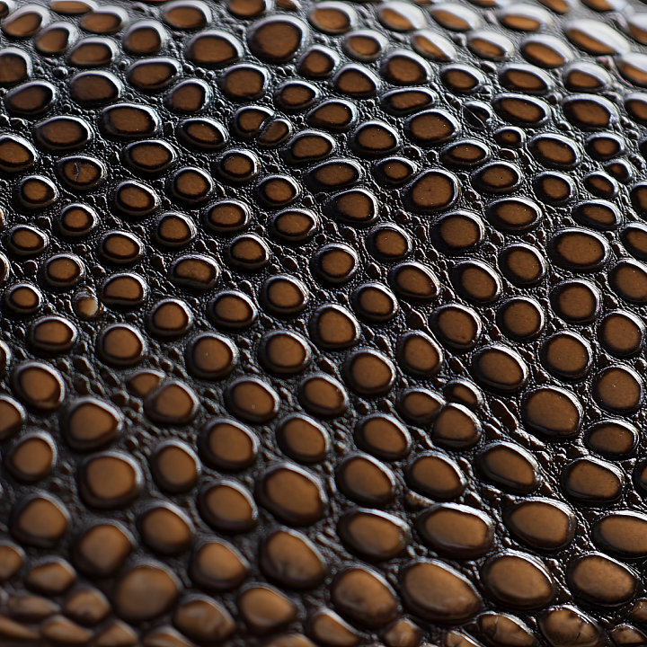 Textured Reptilian Skin with Glossy Raised Scales and Organic Detailing seamless PBR texture preview