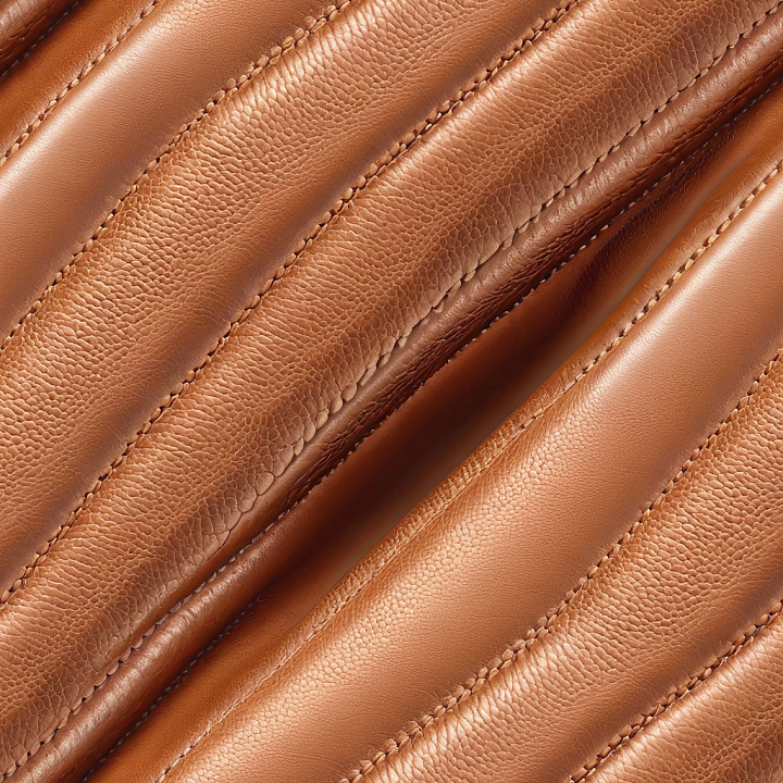 Quilted Brown Leather Upholstery with Pebbled and Smooth Panels seamless PBR texture preview