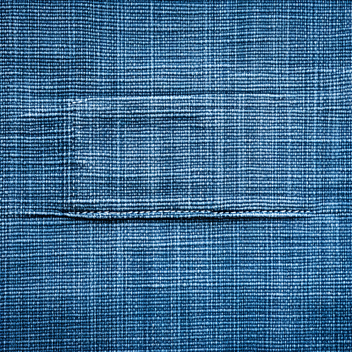 Cracked Denim Fabric with Prominent Horizontal Tear in Blue seamless PBR texture preview