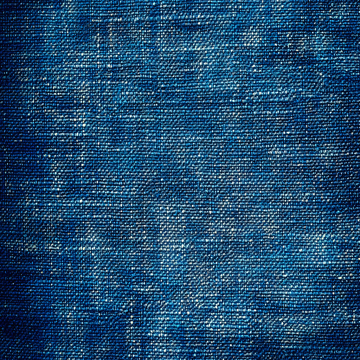 Cracked Denim Fabric in Blue with Detailed Wear Patterns seamless PBR texture preview