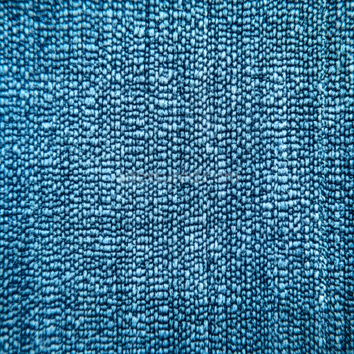 Seamless 3D cracked and textured PBR denim fabric texture with intricate blue fibers