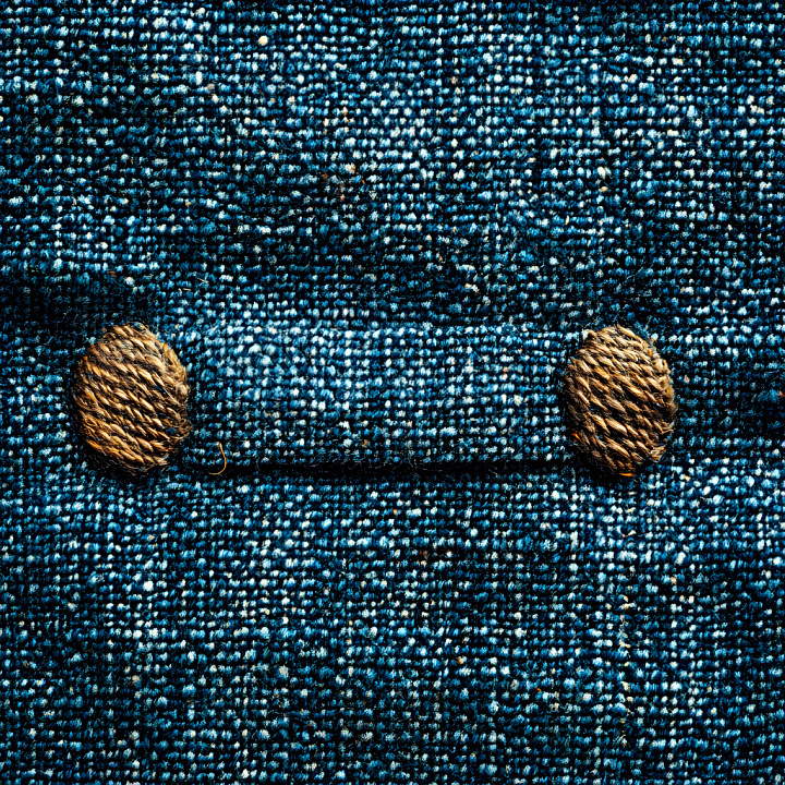 Cracked Denim Fabric with Distinct Worn Holes and Thread Detail seamless PBR texture preview