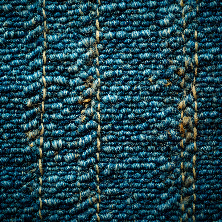 Cracked Denim Fabric with Blue Worn Weave and Frayed Holes seamless PBR texture preview
