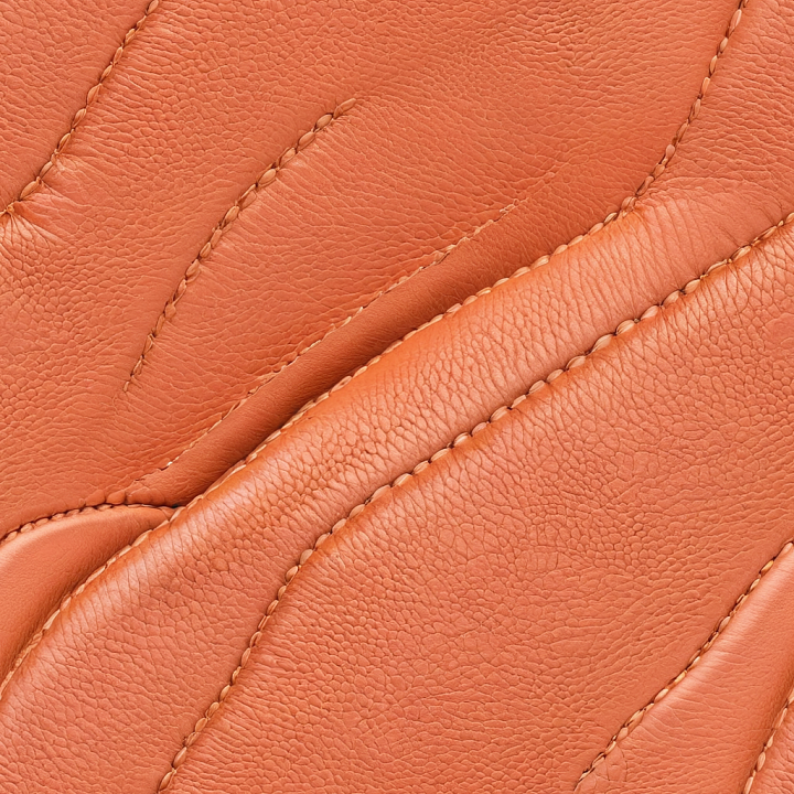 Pebbled Orange Leather Featuring Stitched and Padded Panels seamless PBR texture preview