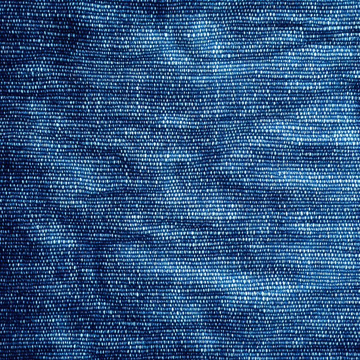 Cracked Denim Fabric With Detailed Weave And Distressed Blue Tones seamless PBR texture preview
