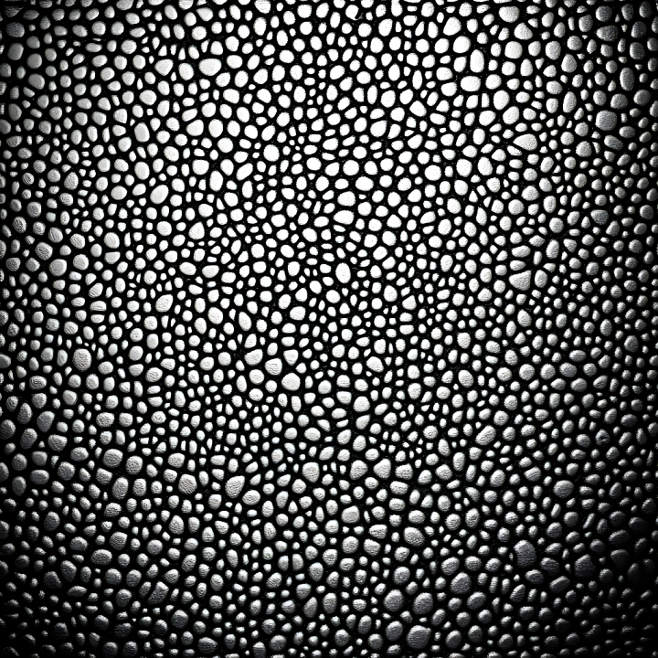 Stylized Reptile Skin Featuring Raised Scales and Organic Pattern seamless PBR texture preview