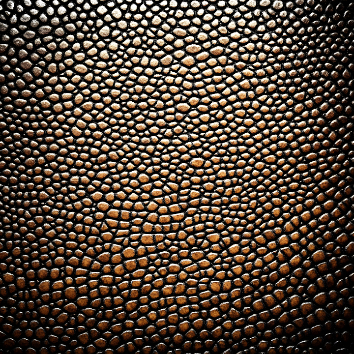 Highly Detailed Reptilian Skin with Raised Scales and Glossy Highlights seamless PBR texture preview