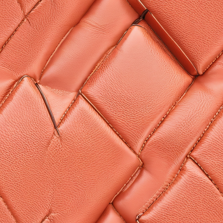 Quilted Orange Leather with Detailed Stitching and Grain seamless PBR texture preview