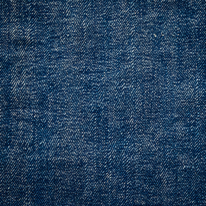 Cracked Denim Fabric with Faded Blue and Worn Threads seamless PBR texture preview