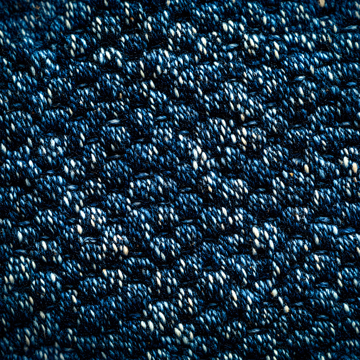 Cracked Denim Fabric with Dark Blue and White Fibers seamless PBR texture preview