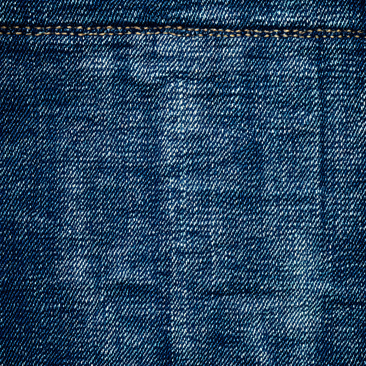 Worn And Torn Dark Blue Denim Fabric With Stitching Details seamless PBR texture preview