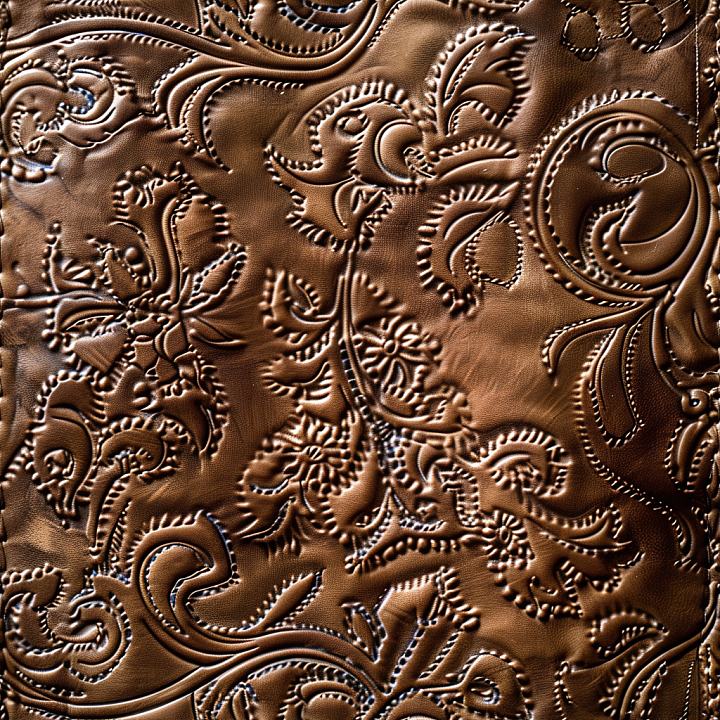 Embossed Brown Leather with Ornate Floral Patterns seamless PBR texture preview