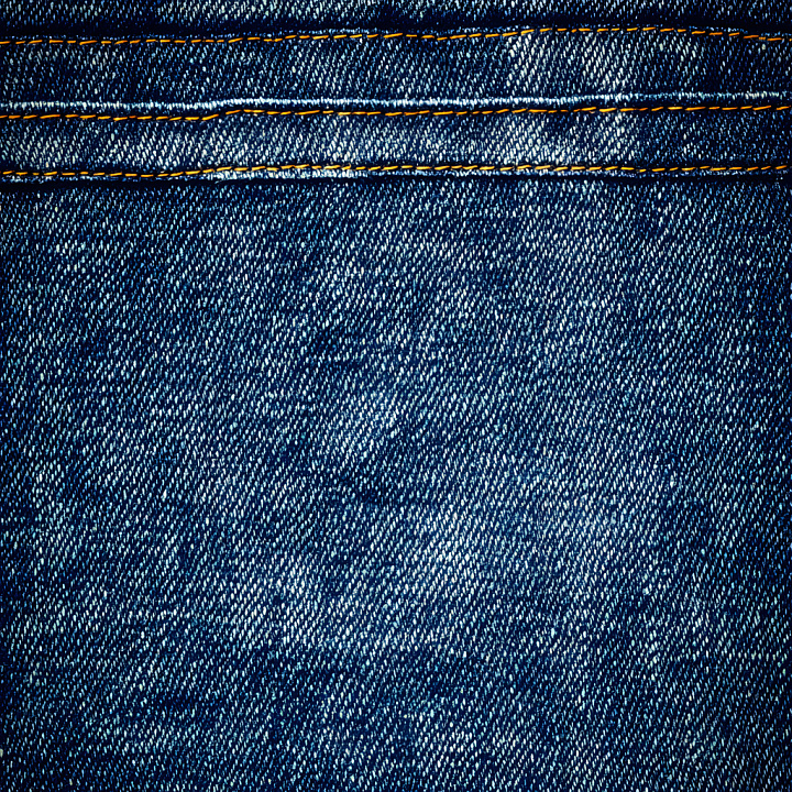 Cracked Denim Fabric with Blue Tones and Orange Stitching seamless PBR texture preview