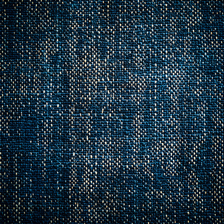 Cracked Denim Fabric with Worn Blue Weave Detailing seamless PBR texture preview