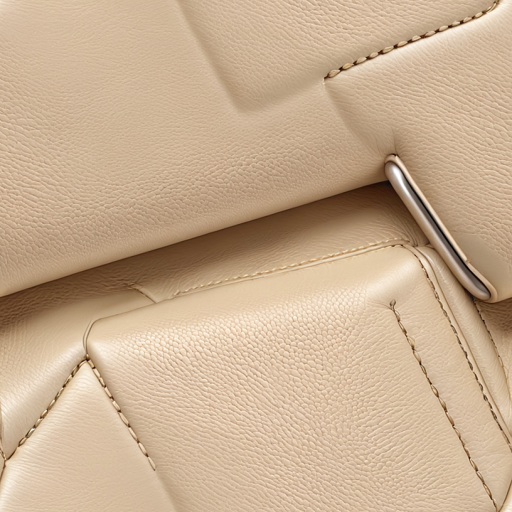 Beige Pebbled Leather Upholstery with Fine Grain and Detailed Stitching seamless PBR texture preview
